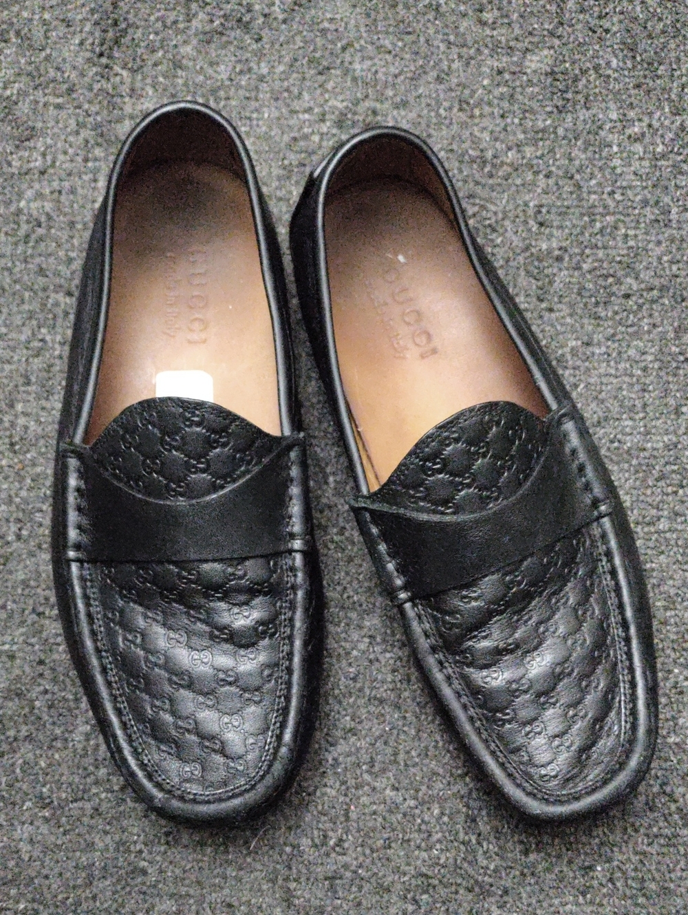 Gucci GG Black Embossed Leather Penny Loafers